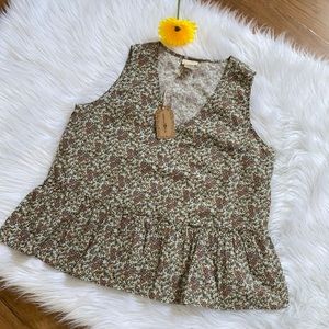 - natural life peplum floral tank. Size M